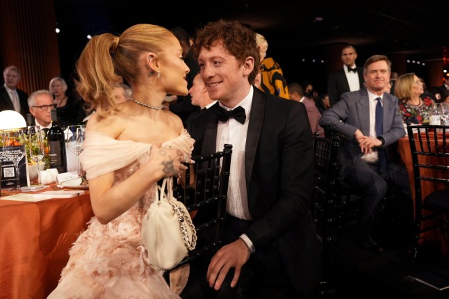Ariana Grande, left, and Ethan Slater in the audience during the 31st annual Screen Actors Guild Awards on Sunday, Feb. 23, 2025, at the Shrine Auditorium in Los Angeles. (AP Photo/Chris Pizzello)