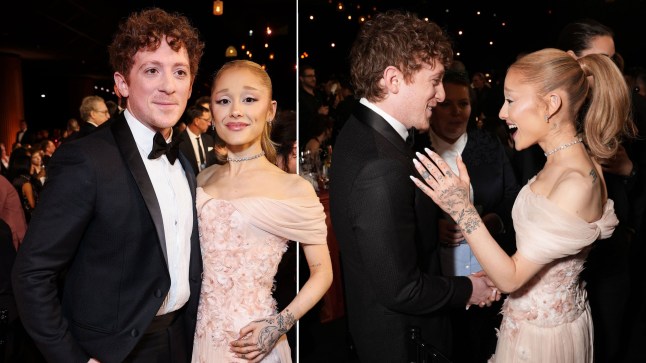 Ethan Slater in a tuxedo and Ariana Grande in a pale pink floral dress bizarrely shake hands while taking to each other inside the SAG Awards