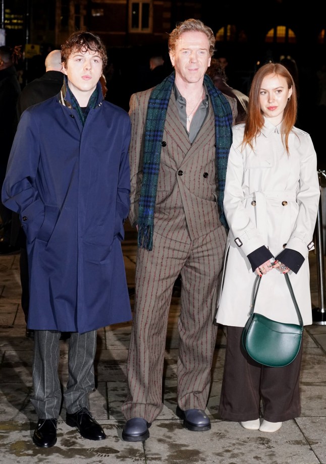(left to right) Gulliver McCrory-Lewis, Damian Lewis and Manon McCrory-Lewis arriving at the Burberry show at Tate Britain, London, during London Fashion Week. Picture date: Monday February 24, 2025. PA Photo. See PA story SHOWBIZ Fashion. Photo credit should read: Ian West/PA Wire
