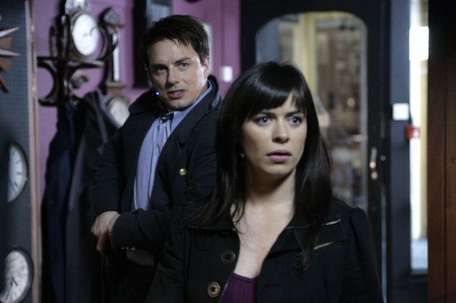 TELEVISION PROGRAMME:TORCHWOOD PICTURED: Jack (JOHN BARROWMAN) and Gwen (EVE MYLES). EPISODE 13 'END OF DAYS' The rift has been opened, and time is splintering all over the world. As events spiral out of control, the Torchwood team are faced with fragments of their past, and terrifying visions of their future. Can Captain Jack save the world? WARNING: Use of this copyright image is subject to Terms of Use of igital Picture Sevice. In particular, this image may only be used during the publicity period for the purpose of publicising 'Torchwood' and provided the BBC is credited. Any use of this image on the internet or for any other purpose whatsoever, including advertising and other commercial uses, requires the prior written approval of the BBC.