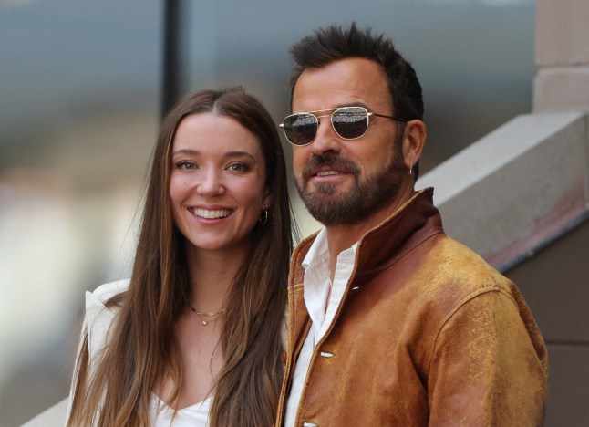Tennis - U.S. Open - Flushing Meadows, New York, United States - September 8, 2024 Actors Justin Theroux and Nicole Brydon Bloom are seen ahead of the final match between Italy's Jannik Sinner and Taylor Fritz of the U.S. REUTERS/Andrew Kelly