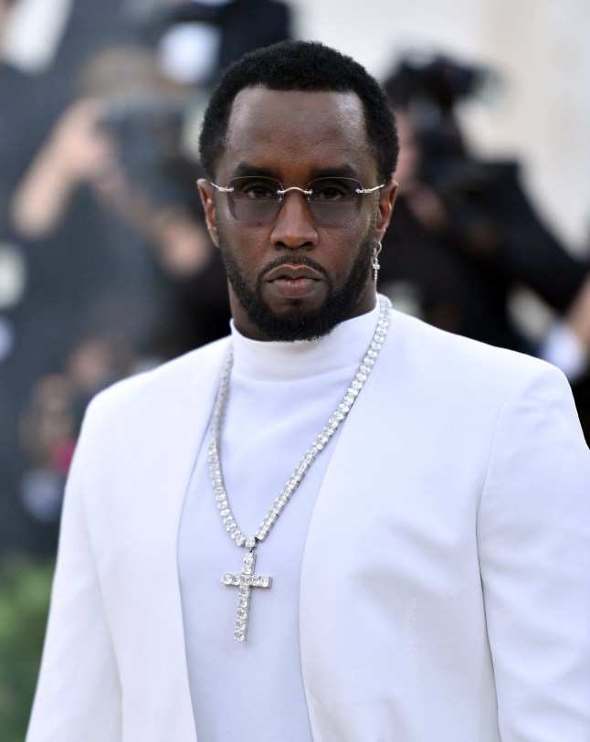 (FILES) Sean Combs 'P. Diddy' arrives for the 2018 Met Gala on May 7, 2018, at the Metropolitan Museum of Art in New York. Music mogul Sean Combs is set to go on trial for racketeering and sex trafficking on May 5, 2025, a judge said in a court hearing October 10, 2024. The rapper known as "Diddy" will remain incarcerated, said federal judge Arun Subramanian, after he was indicted last month on three criminal counts that allege he sexually abused women and coerced them into drug-fueled sex parties using threats and violence. (Photo by ANGELA WEISS / AFP) (Photo by ANGELA WEISS/AFP via Getty Images)