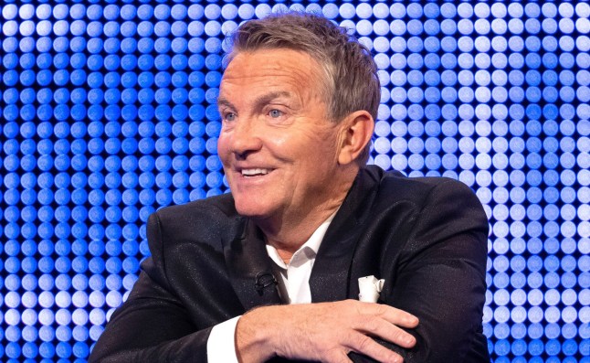 Bradley Walsh smiling while presenting The Chase.