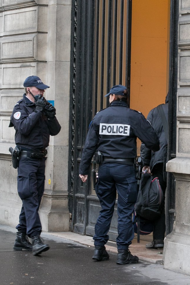 PARIS, FRANCE - JANUARY 09: French Police officers are seen entering the BRB building, Brigade de Repression du Banditisme (suppression of banditry brigade) on January 9, 2017 in Paris, France. (Photo by Marc Piasecki/Getty Images)