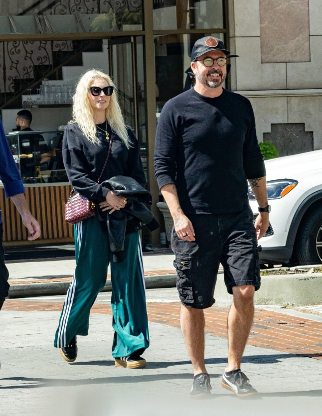 Glendale, CA - *EXCLUSIVE* - Musician Dave Grohl and his wife Jordyn Blum step out for a casual lunch date with a friend in Glendale. The couple enjoys a relaxed outing while catching up over a meal. Pictured: Dave Grohl, Jordyn Blum BACKGRID USA 16 MARCH 2025 USA: +1 310 798 9111 / usasales@backgrid.com UK: +44 208 344 2007 / uksales@backgrid.com *UK Clients - Pictures Containing Children Please Pixelate Face Prior To Publication*