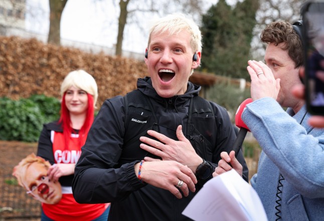 LONDON, ENGLAND - MARCH 17: BBC Radio 1 presenter Jamie Laing with Matt Edmondson (R) during the morning of day one on his 2025 Comic Relief challenge in Hyde Park on March 17, 2025 in London, England. Radio 1's "Ultra Marathon Man with Jamie Laing" for Red Nose Day, will see Jamie conquering daily ultra-marathons across a 5-day stretch, seeing the host run more than 150 miles from London to Salford, Manchester. (Photo by Tristan Fewings/Comic Relief/Getty Images)
