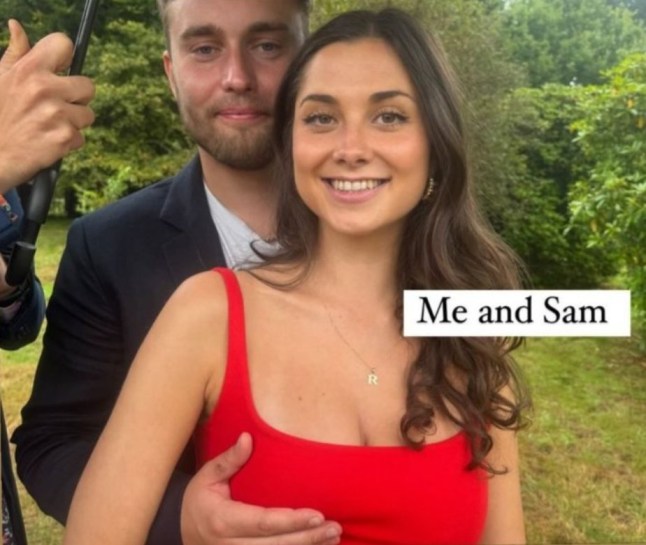 Rosa Collier poses with boyfriend Sam Fender (L). He cups her breast with his hand for the snap.