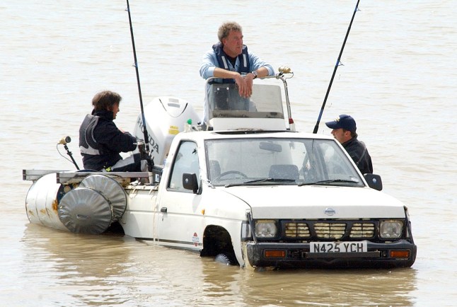 Mandatory Credit: Photo by REX/Shutterstock (677162d) Jeremy Clarkson off the beach in Dover, with engine problems - Top Gear presenters James May, Richard Hammond and Jeremy Clarkson attempted to sail the Channel in three cars. The three vehicles involved were a VW Camper van, a Triumph Herald and a Nissan with a motor . Unfortunately, two of the three vehicles sank shortly after leaving Dover, but the Nissan made it across, accompanied by a coastguard. The episode of Top Gear is due to be shown in the Autumn 'Top Gear' presenters attempt to sail the Channel in three cars, Dover, Kent, Britain - 19 Jul 2007
